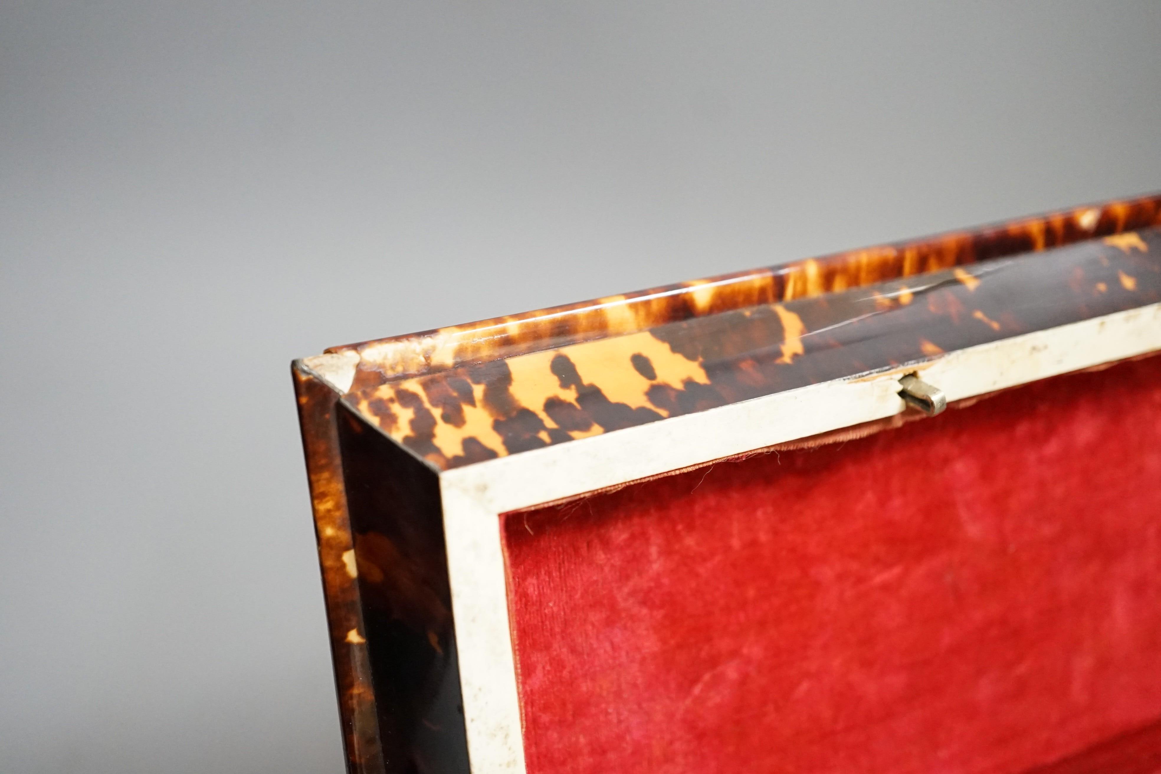 A Victorian tortoiseshell and ivory mounted tea caddy, 18cms high